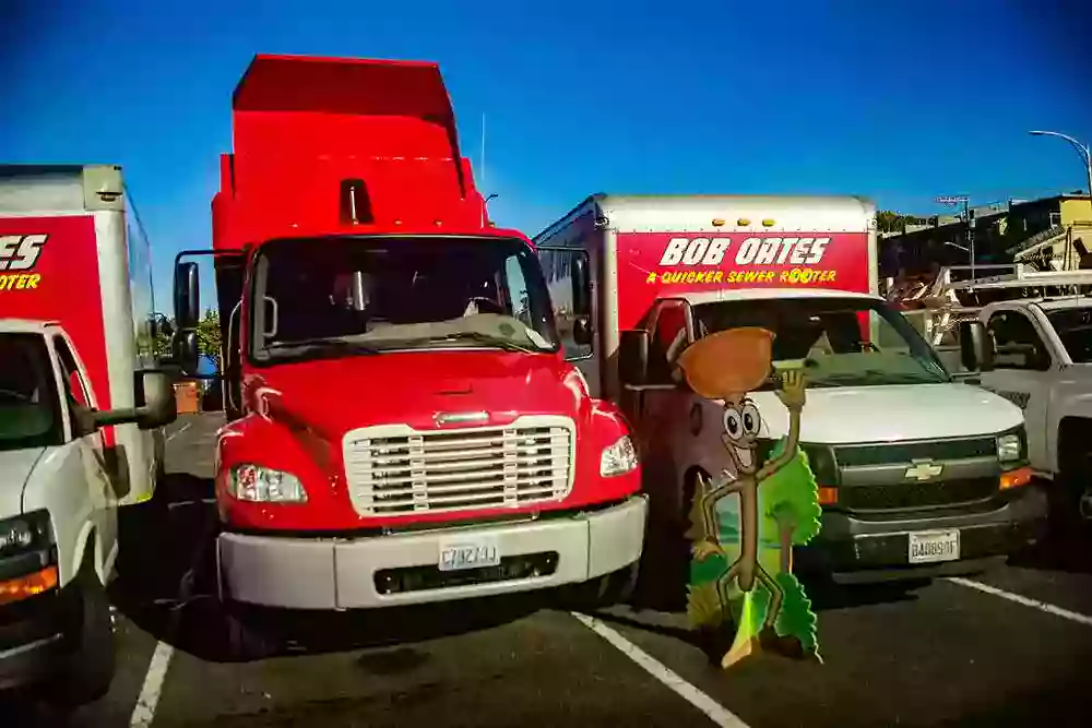 Bob Oates work trucks lined up in parking lot