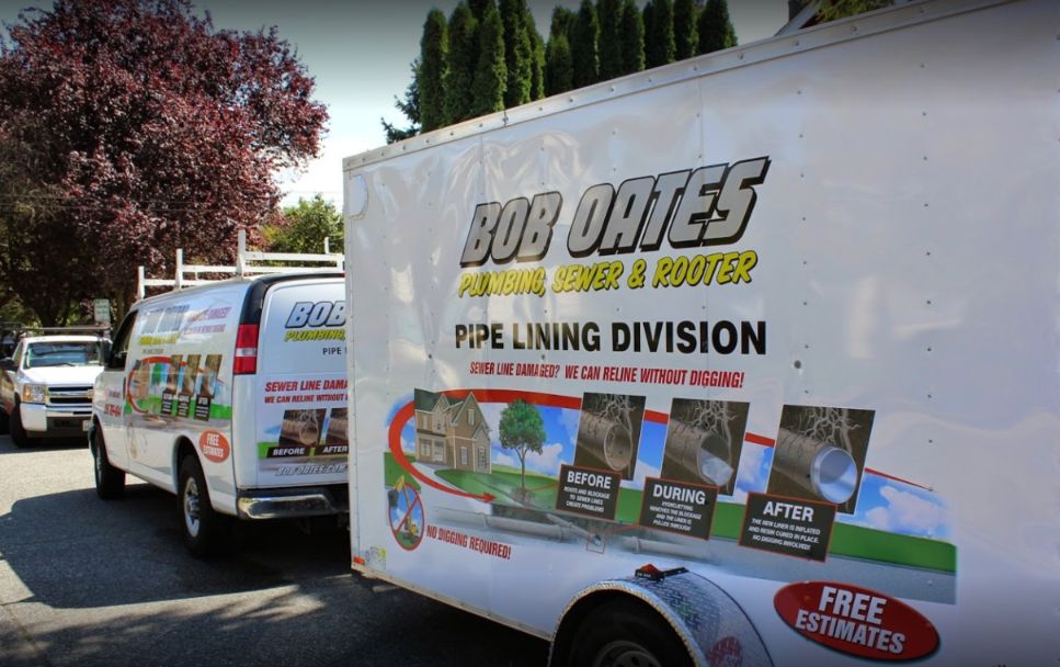 Bob Oates Sewer and Rooter work trucks