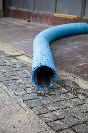 Close up of water coming out of drain pipe