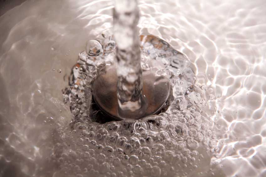 Water splashing down the sink