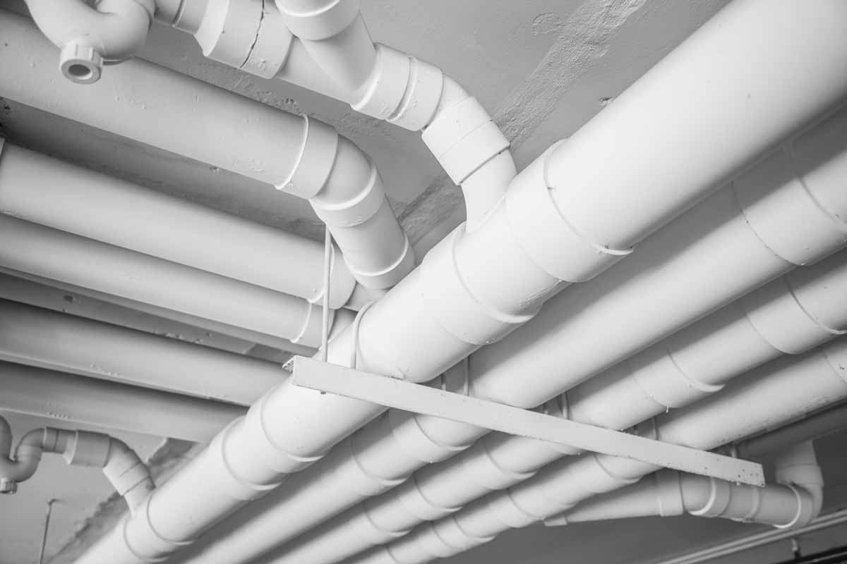 Water pipes running along ceiling