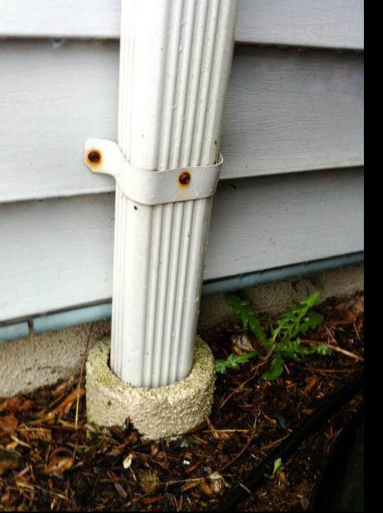 Down spout going into the ground