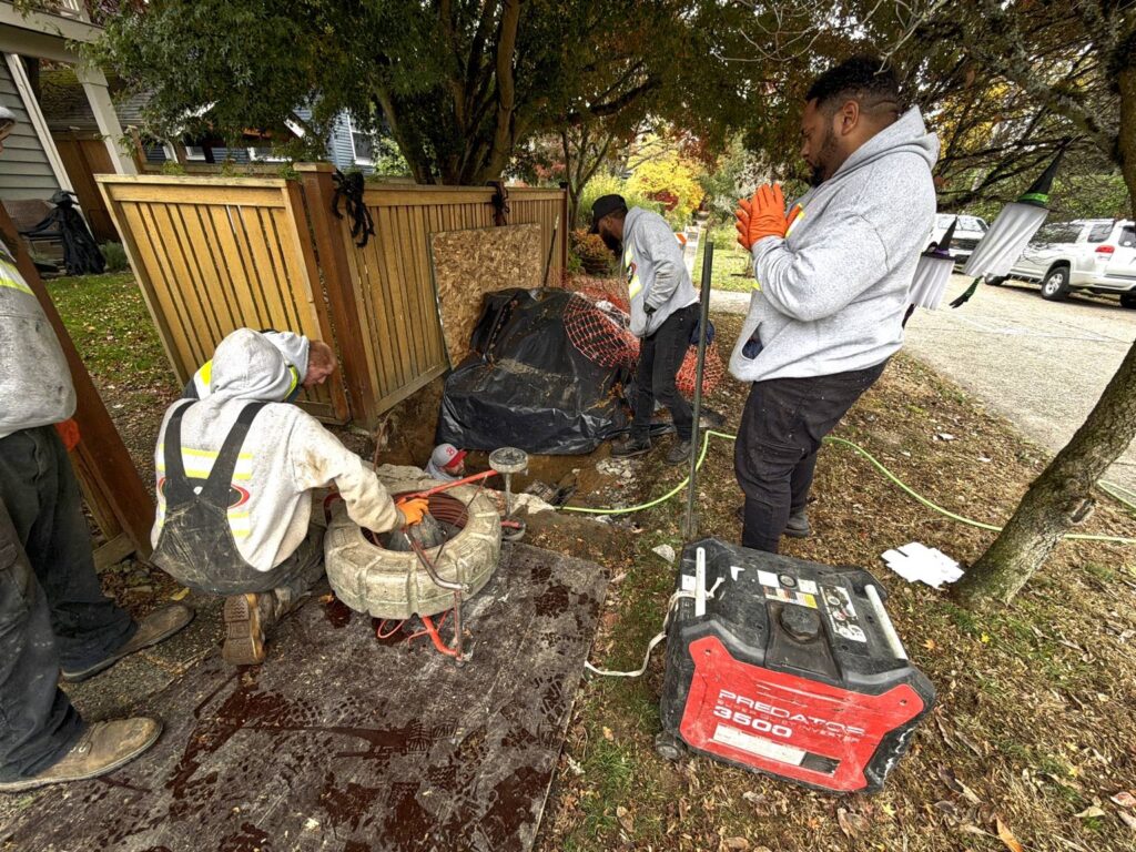 Hydro jetting service used to restore sewer flow after cable obstruction in pipe