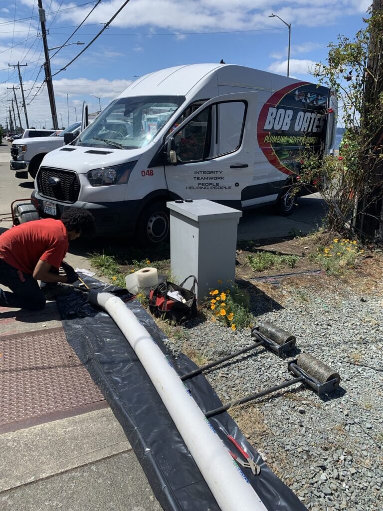Bob Oates technician preparing a sewer liner before trenchless sewer repair in the Greater Seattle area
