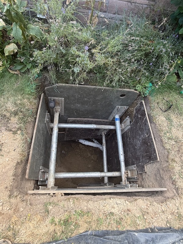 Limited excavation for a side sewer repair at a Rainier Beach home in Seattle