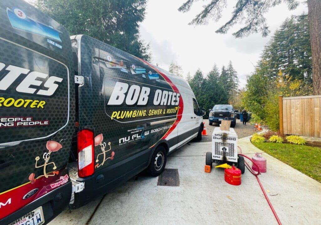 Bob Oates van and equipment at residential sewer job, Bellevue, WA