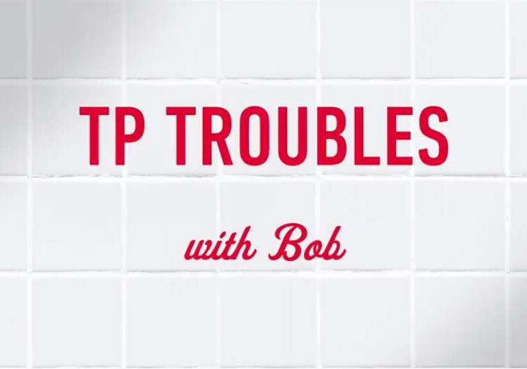 Tile background with "TP Troubles" written across tiles