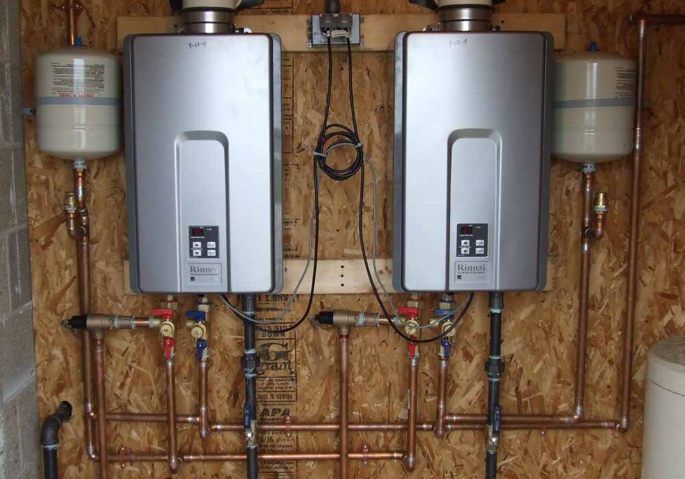 Dual tankless water heater setup installed by Bob Oates Plumbing for increased hot water capacity.